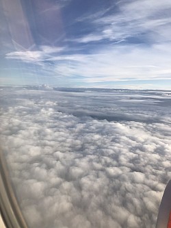 Photo of different shapes of Clouds in airplane.